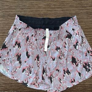 Lulu lemon womens track that 5” short.  New w/o tags.  Grey/black/burgundy color